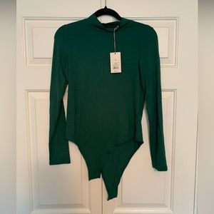 A new day bodysuit. NWT